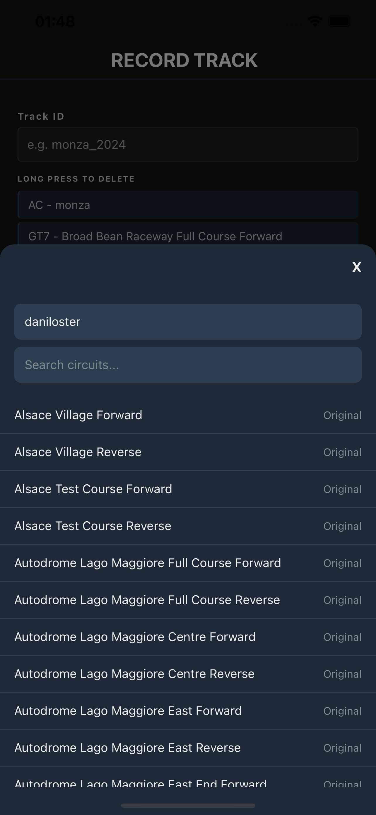 Track selection modal showing circuit list and Driver ID field